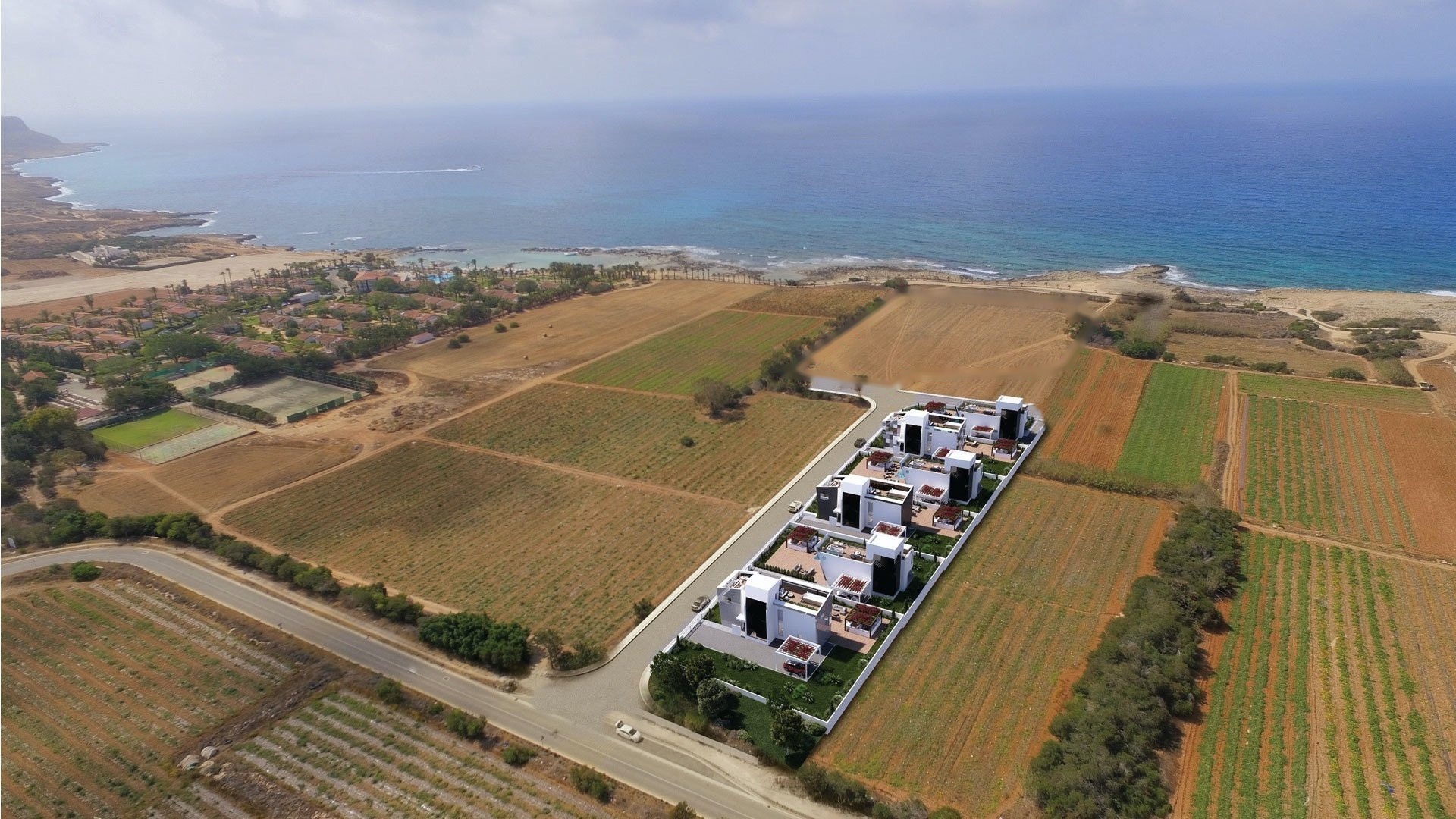Aerial view of the Limnara coastline in Ayia Napa, looking towards Cape Greco